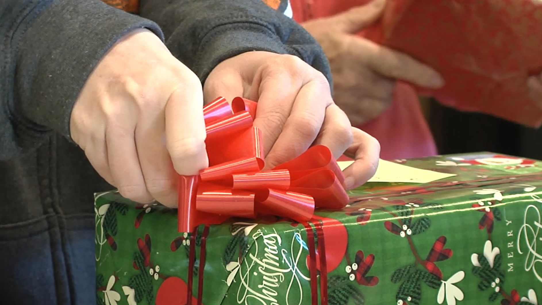 Volunteers preparing gifts for Wraps Taps